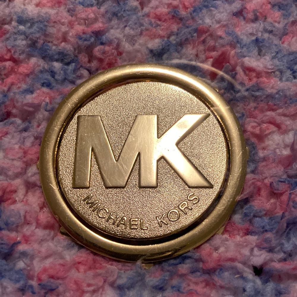 MK emblem.